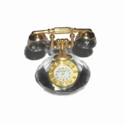 Ceas din cristal multifatetat, cu elemente metalice aurii