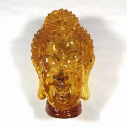 Capul lui Buddha din chihlimbar industrial