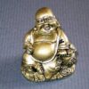 Statuia lui Buddha razand cu Vasul Abundentei