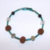 Bratara cu sfere de Rudraksha, pe metal cu memorie