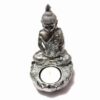 Buddha Tamaduitorul argintiu, cu lumanare