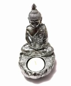 Buddha Tamaduitorul argintiu, cu lumanare