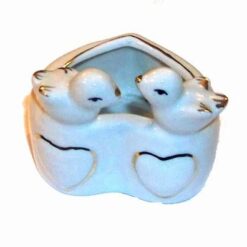 Casetuta din portal cu pasarile fericirii