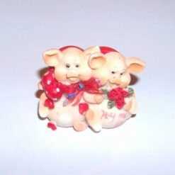 Pereche de purcelusi cu inimioare