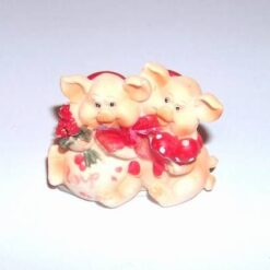 Pereche de purcelusi cu inimioare